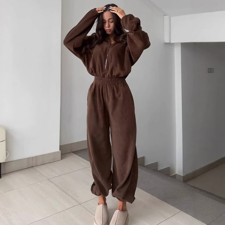 The new fashionable long-sleeved jumpsuit for women from European and American Spring and Autumn Women's Clothing, a casual semi-open-collar stretched-waist jumpsuit full figure