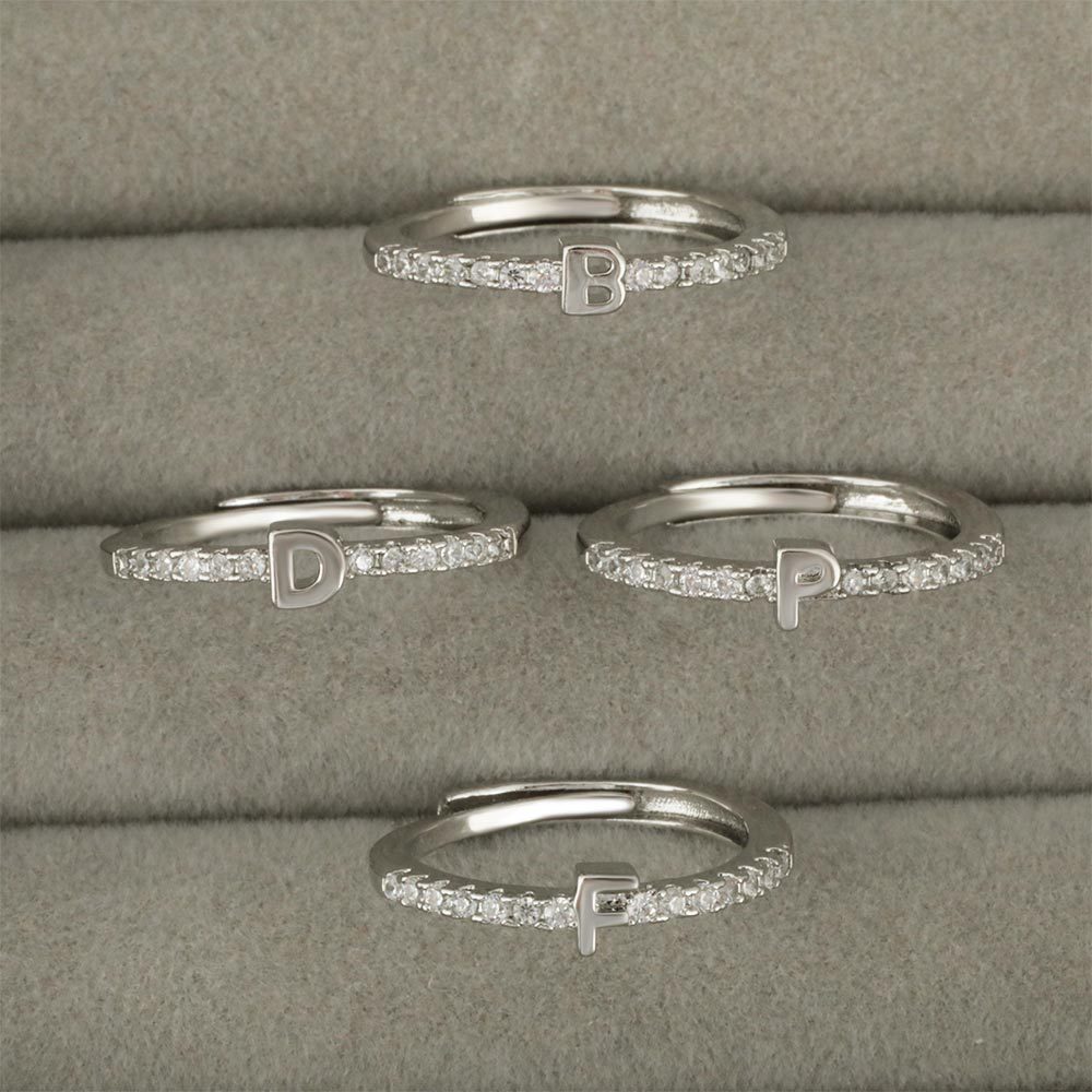A new cross-border copper-inlaid zircon 26-letter ring with adjustable opening, exuding a fashionable and sophisticated charm details Picture