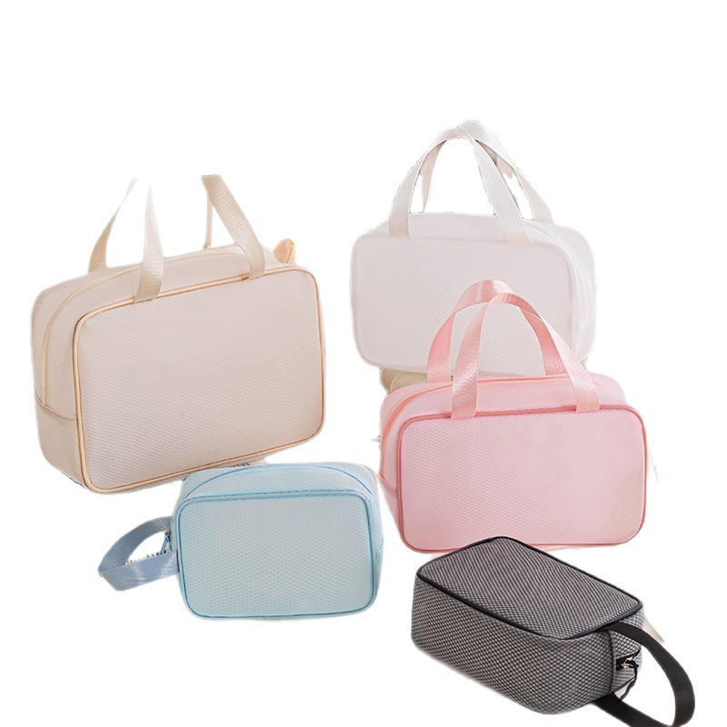 洗漱包/折叠洗漱包/干湿分离收纳包/洗漱包挂/洗漱包透明白底实物图