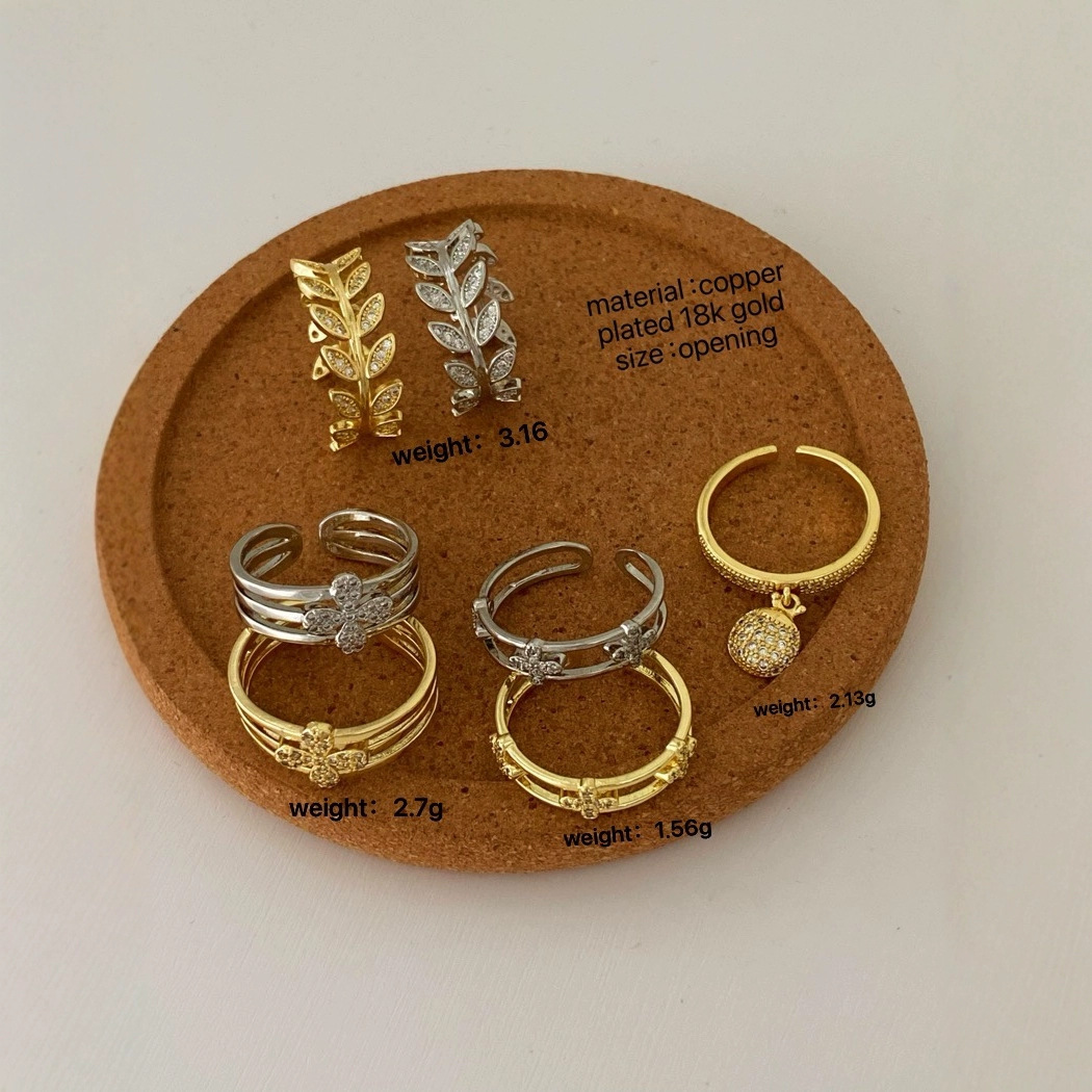 Direct sales of zircon four-leaf clover petal and leaf hollowed-out rings in European and American fashion cross-border Specification drawing