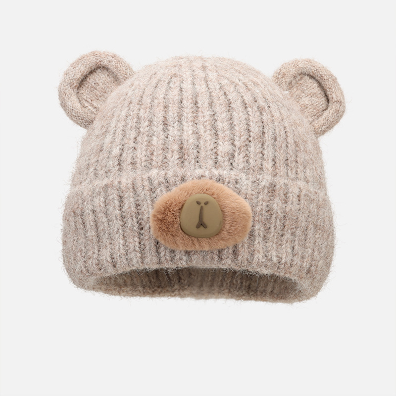 Korean-style cute bear knitted hat for students, versatile for autumn and winter, a small double-layer cold-proof, warm and ear-protecting knitted hat Application Scenario