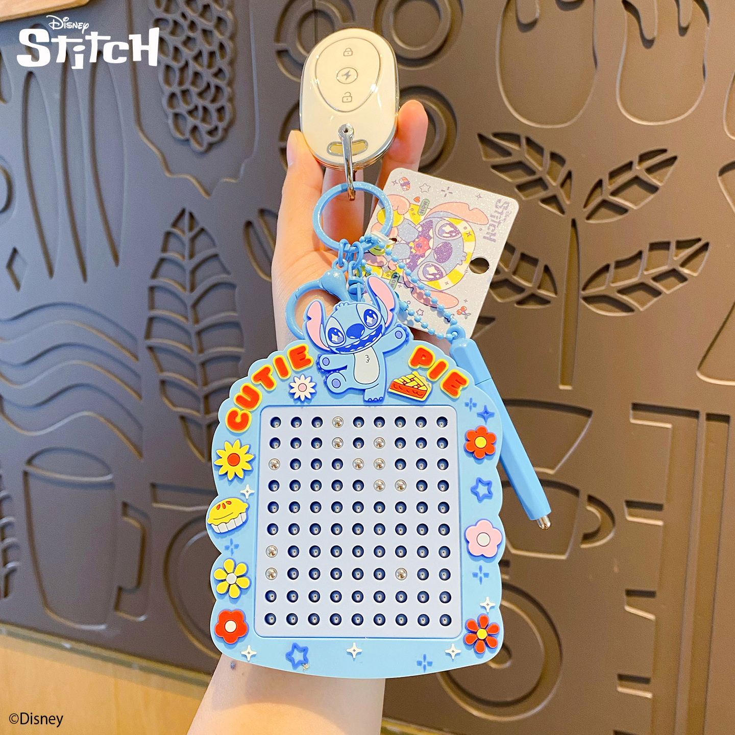 Genuino stitch deprensado llavero adorable arco cuentas de acero drawing board colgante divertido juguetes para niños bolsa colgante decoración details Picture