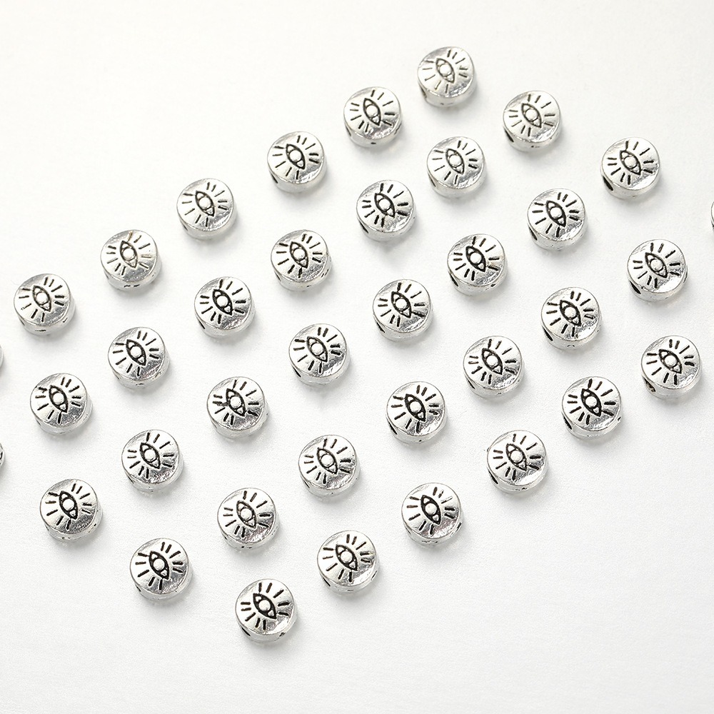 Cross-border classic and personalized alloy eye flat spacer beads, retro imitation silver wholesale pendants, bracelets, necklaces, clothing accessories Application Scenario