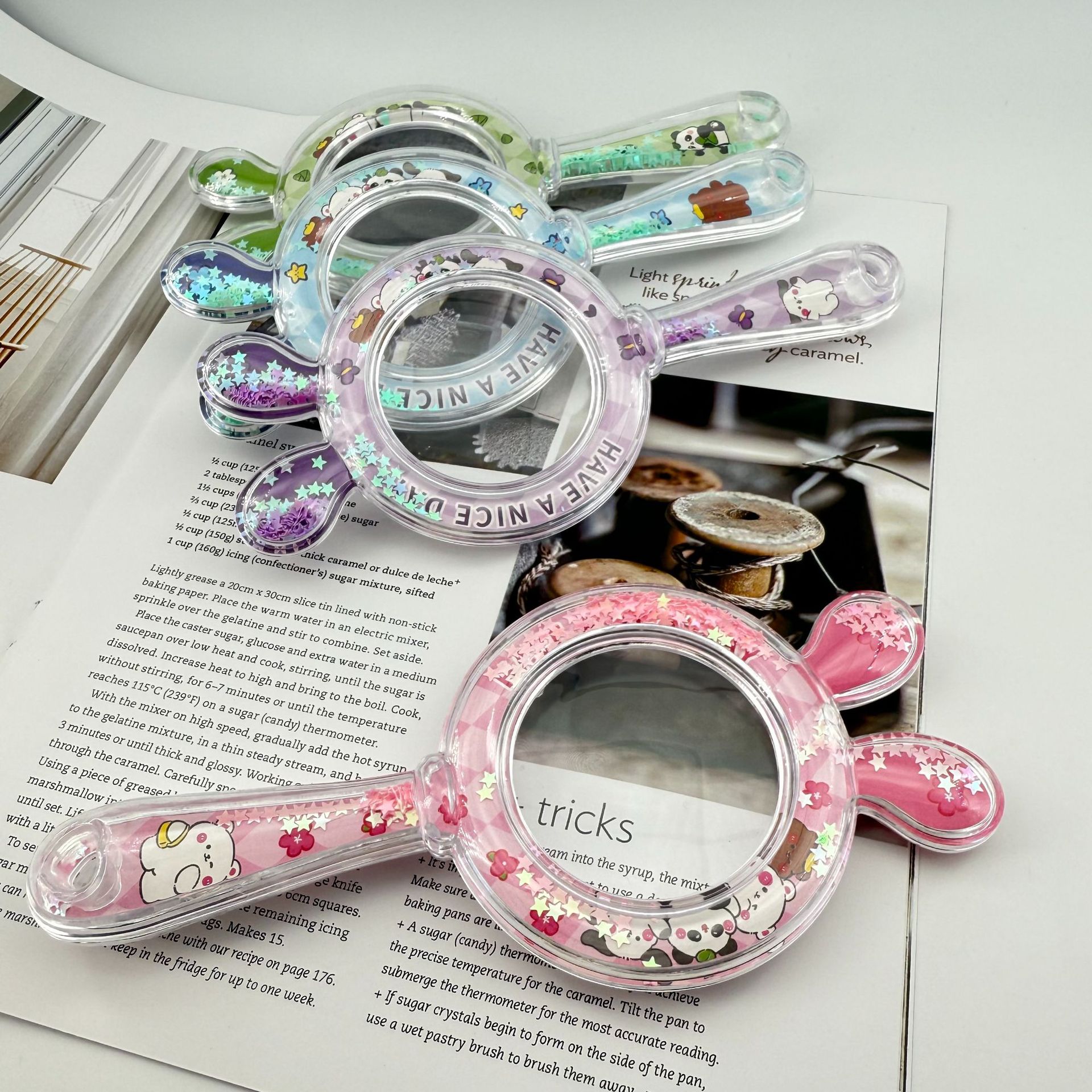 Wholesale of children's cartoon color magnifying glass, air cushion, hand-held magnifying glass, children's toy sets, observation and exploration teaching AIDS details Picture