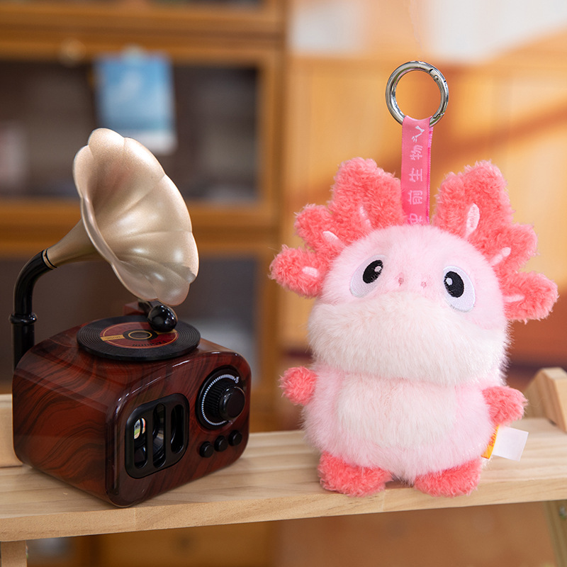 A grey totoro wearing a wizard hat and a red horned dragon plush toy AI star Man AI toy Specification image
