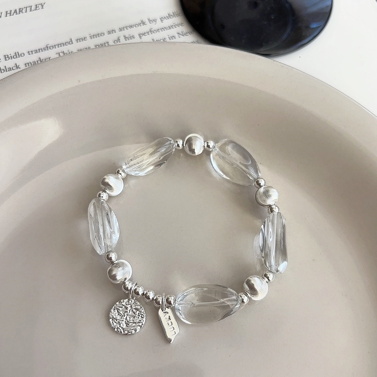S925 sterling silver white crystal brushed cat's eye round brand bracelet, fashionable INS style elastic rope, niche design women's bracelet Specification image