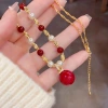 This autumn and winter new style of fashionable and retro beaded red pearl pendant necklace is unique, light luxury, gentle and versatile. It's a collarbone chain for women Application Scenario