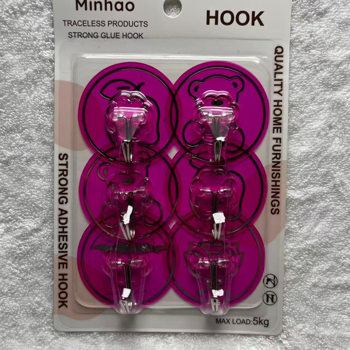 New round gold-embossed film plum blossom sheet iron hook, no drilling, no mark hook, living room wall-mounted door, rear hanging bag hook Application Scenario