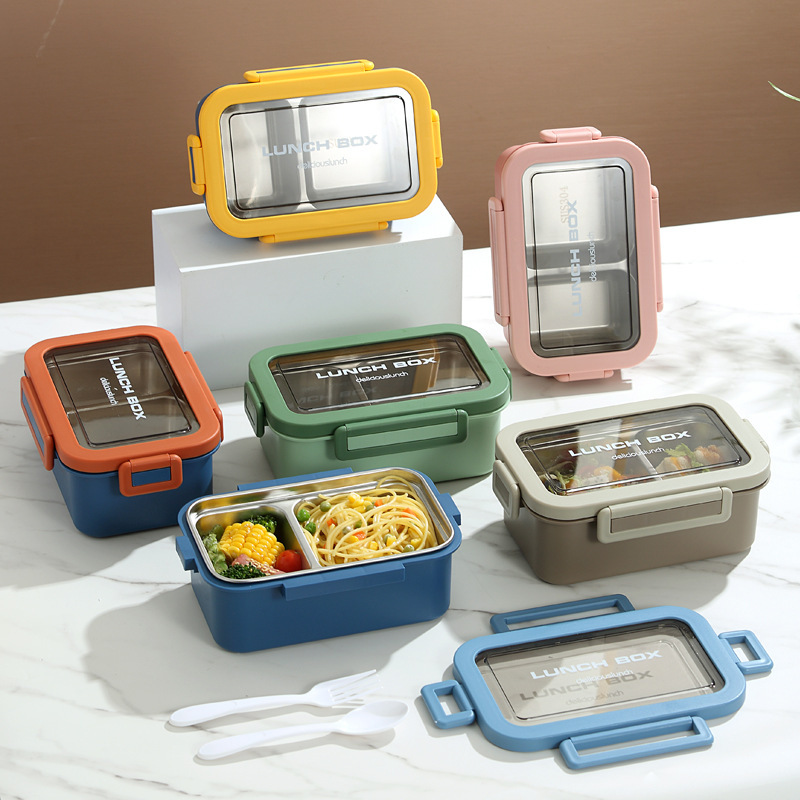 The simple and sealed double-layer lunch box with compartments is portable for office workers and students. It is a stainless steel box with heat preservation