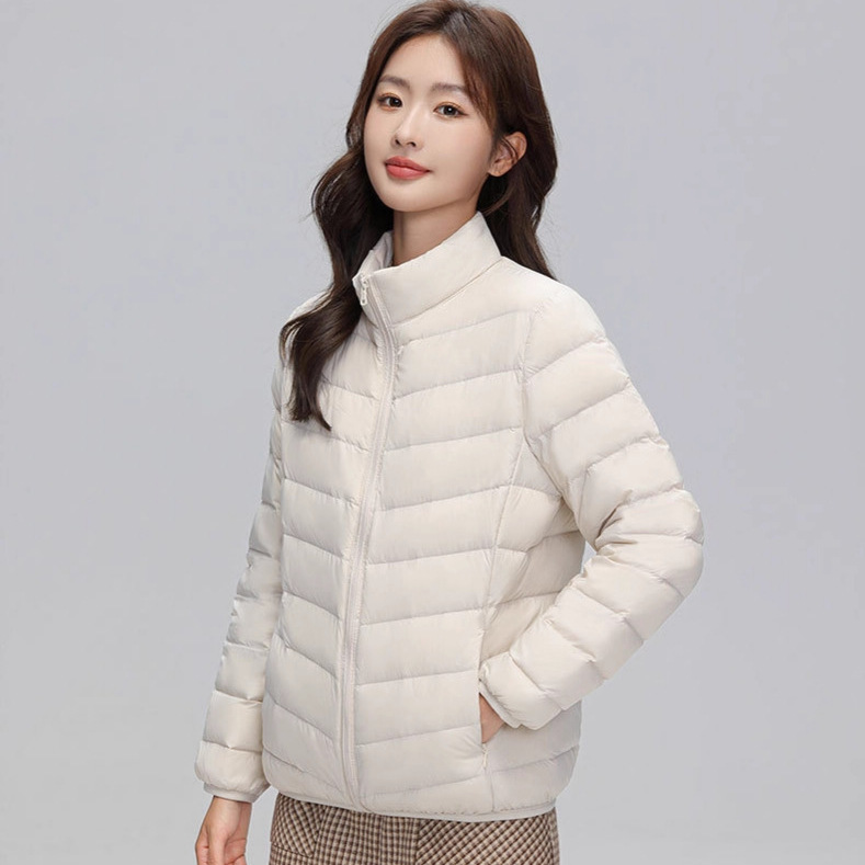 A light and thin down jacket for women in the autumn and winter of 2025, a short 90mm white duck down winter stand-up collar, a slimming casual coat trend