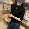 This Korean high-end, super good-looking off-the-shoulder, mid-sleeved knitted sweater is a new slimming top for women in Spring/Summer 2025 Application Scenario