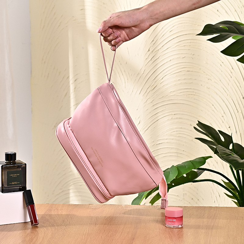 Cosmetic bag with high appearance level, portable and hand-held skin care and cosmetics storage bag, large capacity, high-end feel, cloud shape details Picture
