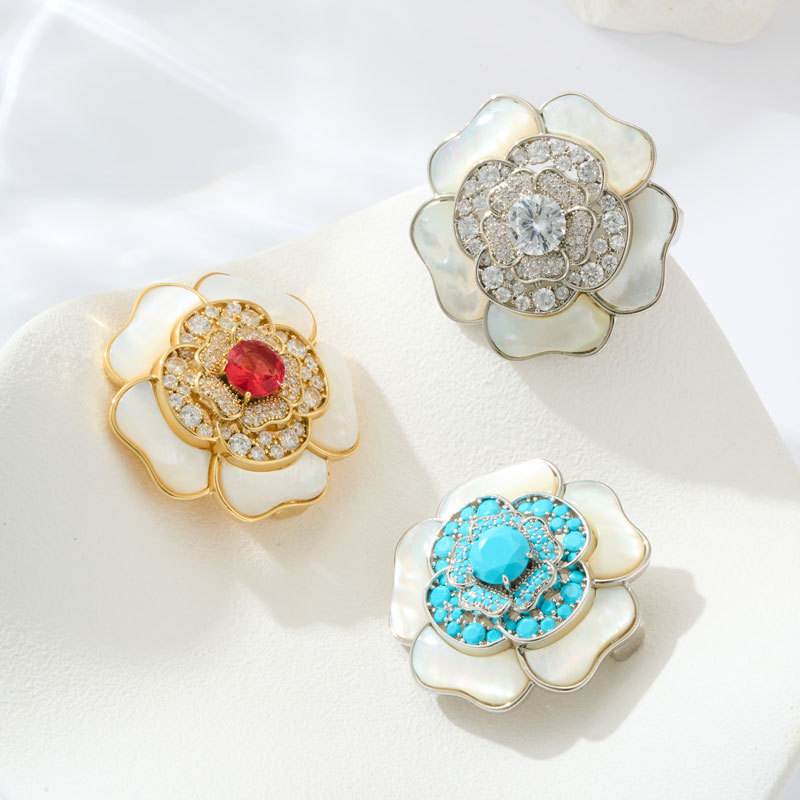 A light luxury and high-end natural mother-of-pearl camellia brooch, copper alloy slightly inlaid zircon, fashionable and versatile women's accessory pin