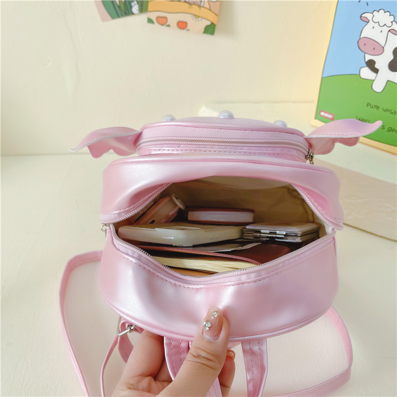 Rainbow gradient sequin backpack, pearl shell pattern, pink bow, outdoor hiking canvas schoolbag, lightweight and durable Application Scenario