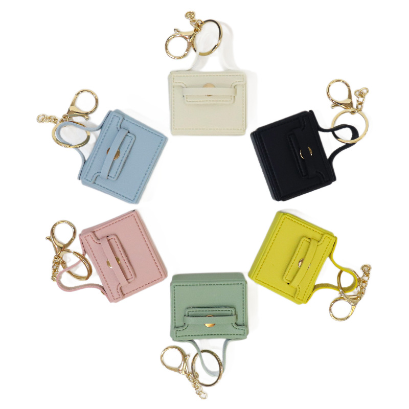 Huayang's new multi-functional small square bag features a creative mouth, red envelope, keychain, earphone bag, and a car-carrying pu key chain pendant Item Picture
