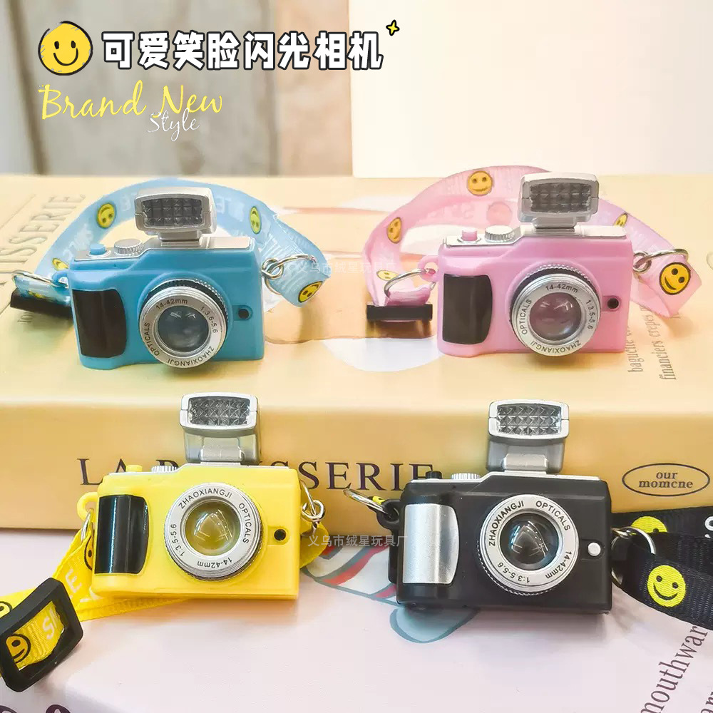 Mini camera pendant, plush toy, electronic light-emitting and sound-emitting simulation camera, cotton doll, smiling face adjustment rope