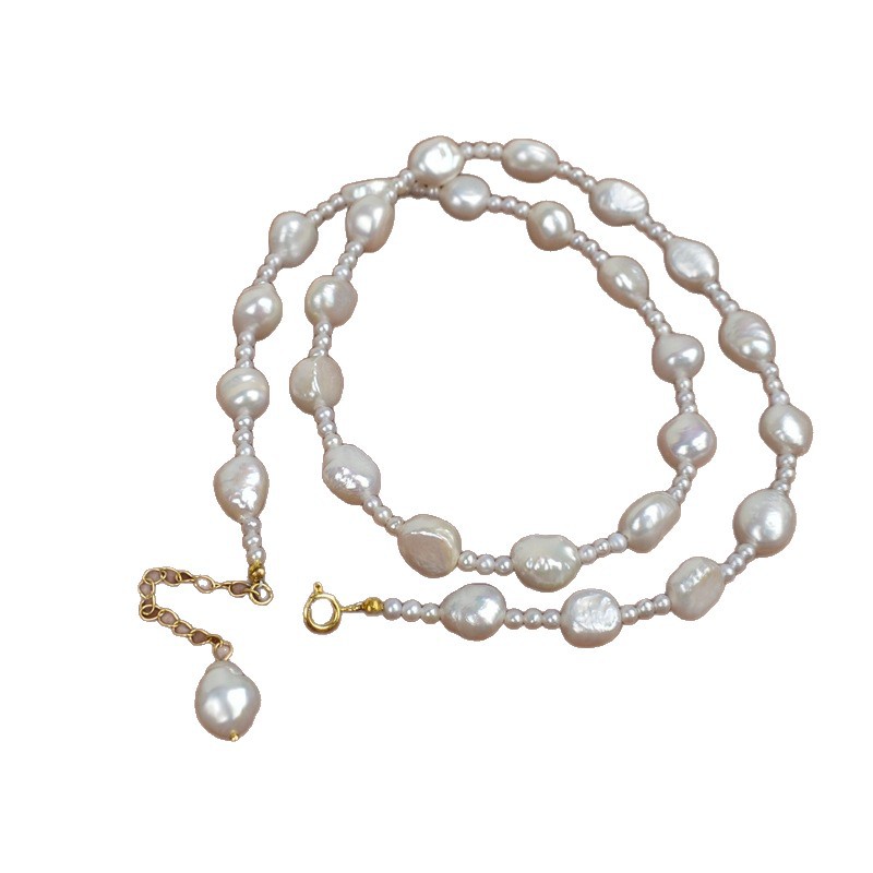 This natural-shaped pearl necklace with an extended design is a versatile and luxurious Baroque pearl sweater chain that exudes a sense of sophistication Item Picture