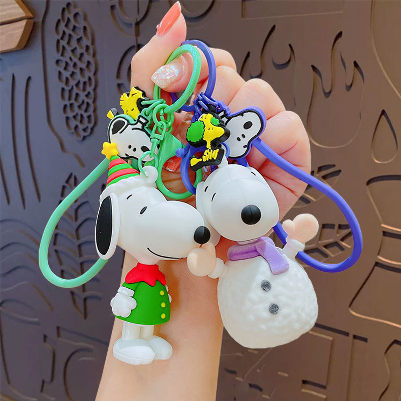 Wholesale of genuine cartoon warm winter Snoopy series keychains, couple schoolbags, pendants, key chains and creative small gifts