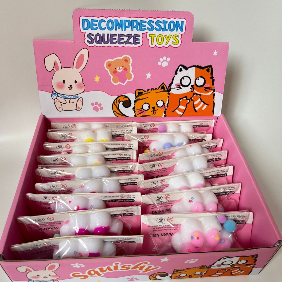 A cute cartoon toy with plush cat PAWS and a muddy feel, an educational puzzle details Picture