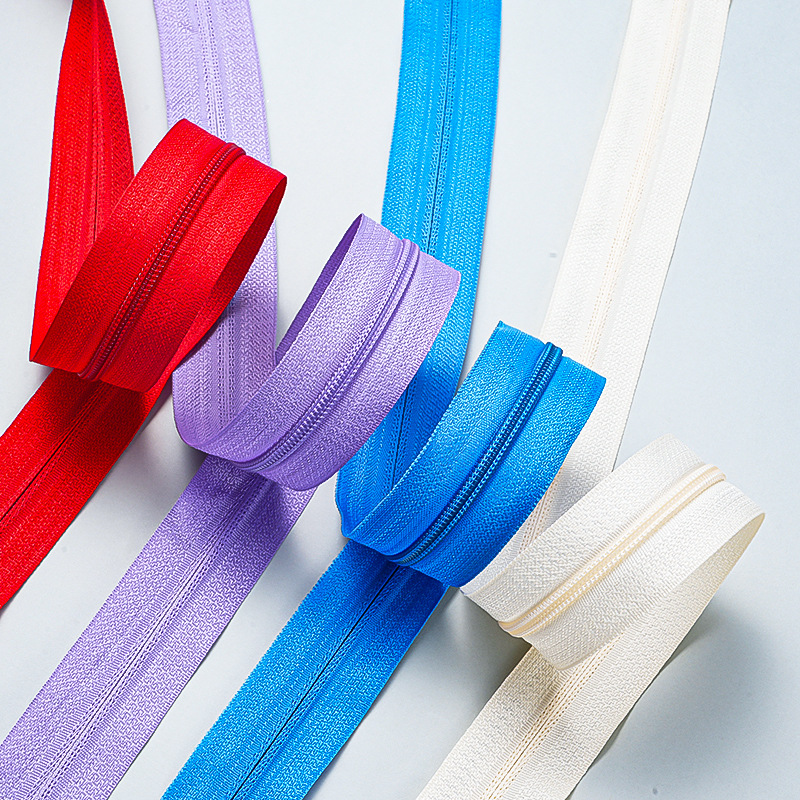 Wholesale of 100-meter bundles of nylon zippers with No. 3 and No. 5 sizes. Available in multiple colors for wholesale details Picture