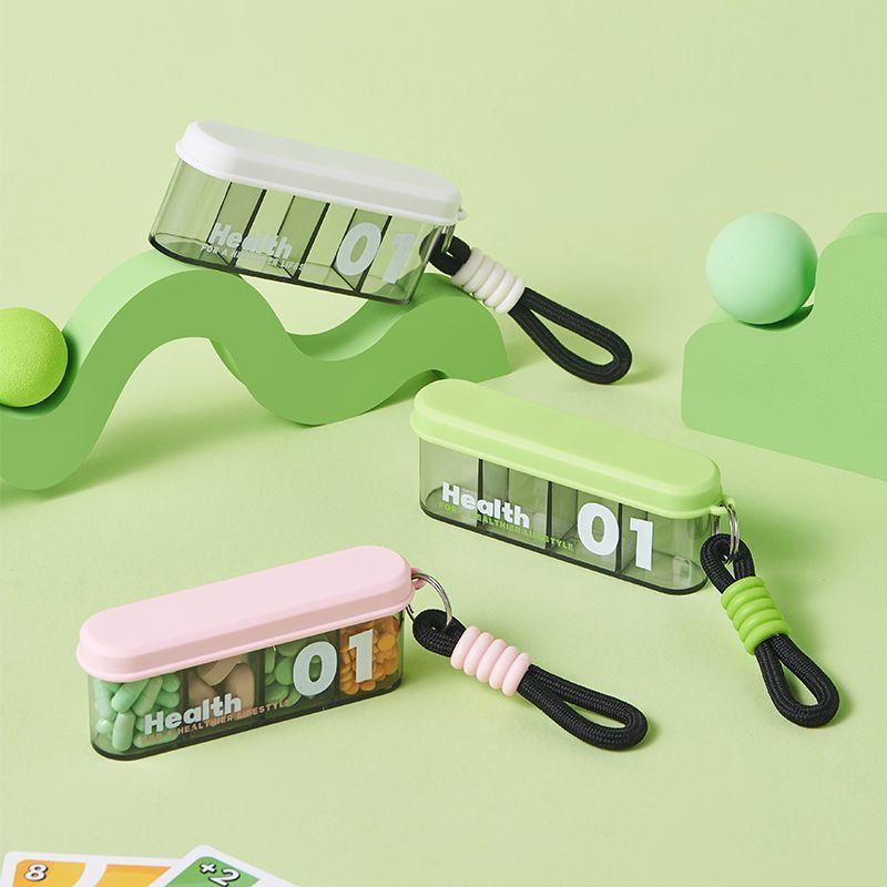 Portable medicine box, small medicine dispensing box, mini medicine storage box for seven days a week, divided into compartments for three meals a day Specification image