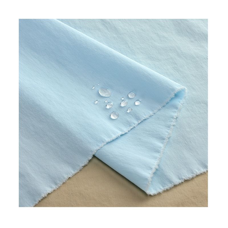 登山裤面料70D加密棉感四面弹透气防水微皱钓鱼服运动裤帽子布料