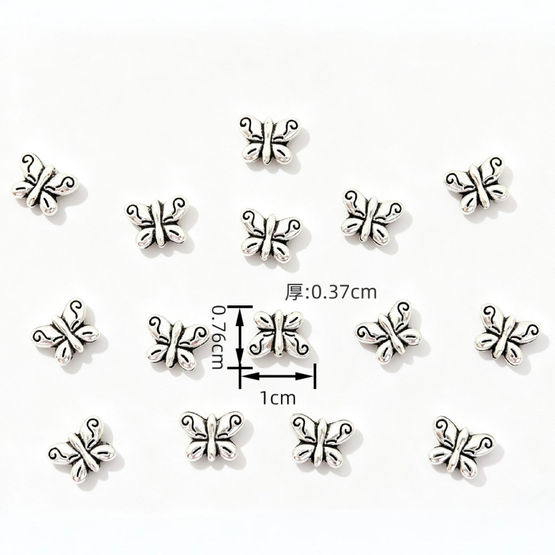 Vintage alloy butterfly beads ethnic DIY pulsera collar beads accesorios varios a través de agujeros butterfly beads Specification image