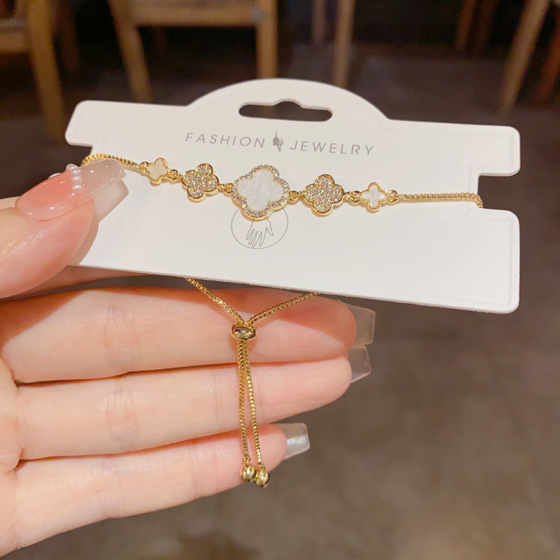 Versión coreana diseño de nicho circón cuatro hojas pulsera floral versátil sentido de alta clase moda ligera extravagancia influenciador decoración de la mano al por mayor Specification image