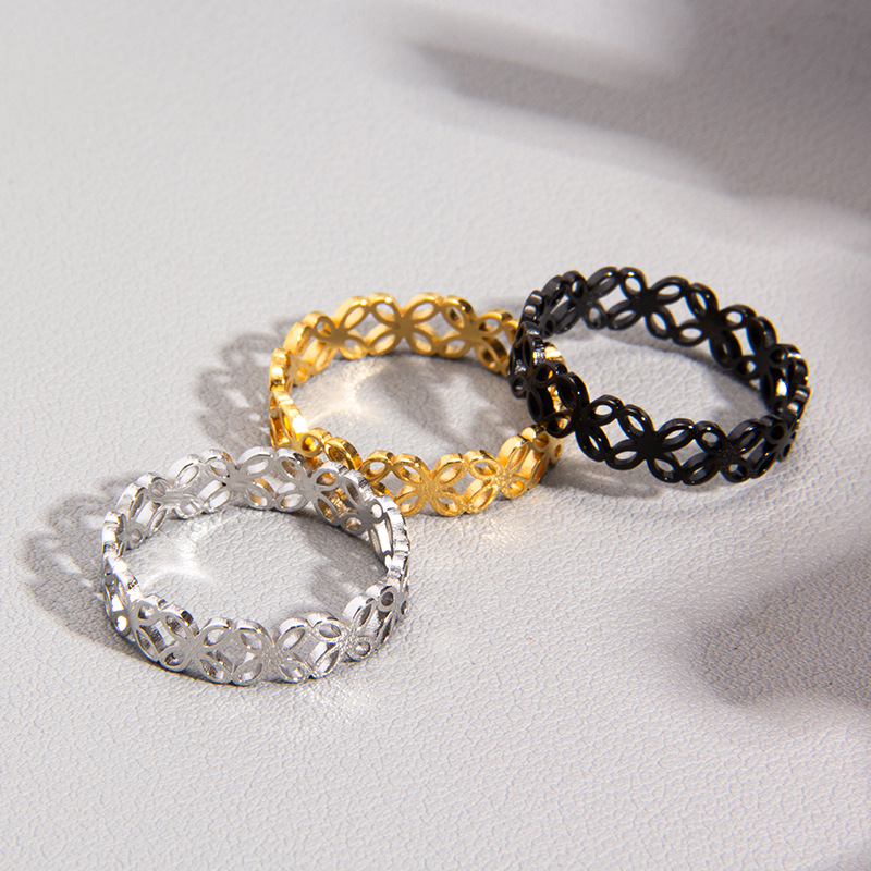 Laser-cut four-leaf flower hollowed-out titanium steel women's rings and couple rings in the style of Instagram in Japan and South Korea details Picture