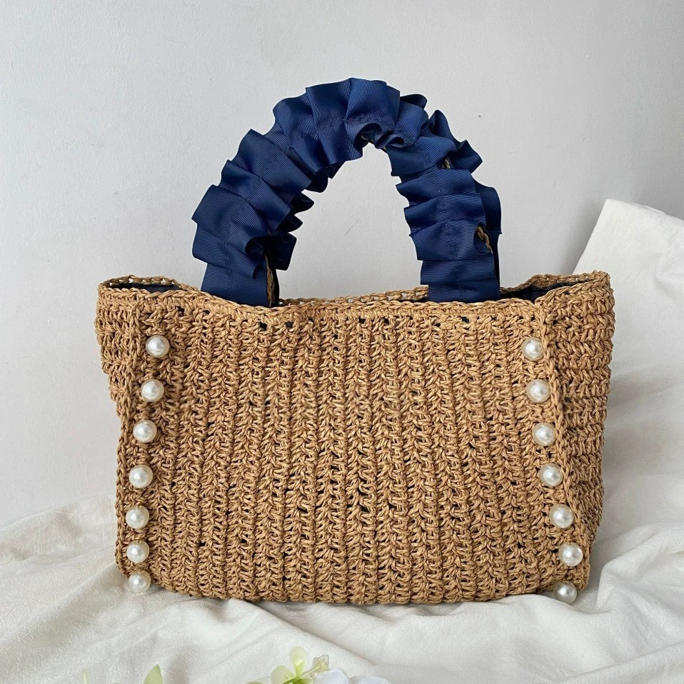 Bolso de paja transfronterizo bolso de paja de mano perla bolso de paja de mano tejido a mano bolso lánguido bolso de mujer bolso de playa de viento vacacional bolso casual tote bolso de paja hecho a mano