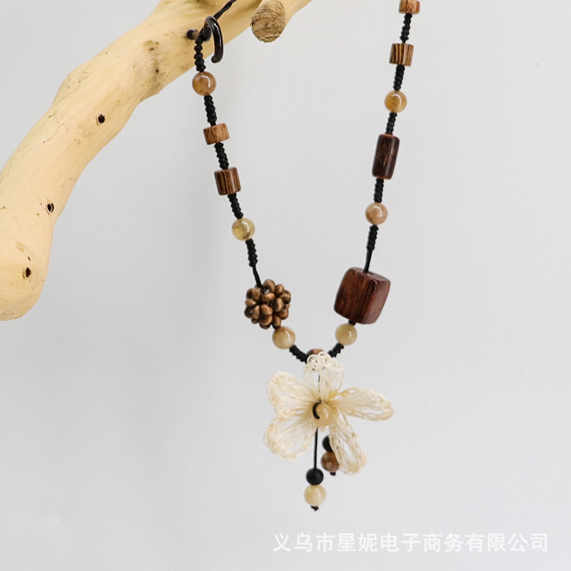 民族风个性时尚毛衣链女款手工编织五叶花吊坠鸡翅木挂链项链饰品