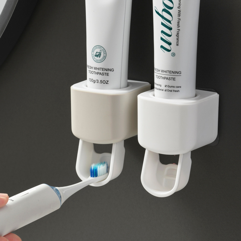 Simple style bathroom wall-mounted toothpaste dispenser without perforation toothpaste dispenser with kraft paper box Application Scenario