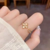 Wholesale of niche, stylish and simple shell four-leaf flower open rings for women, with a unique, light luxury and distinctive design sense Specification image