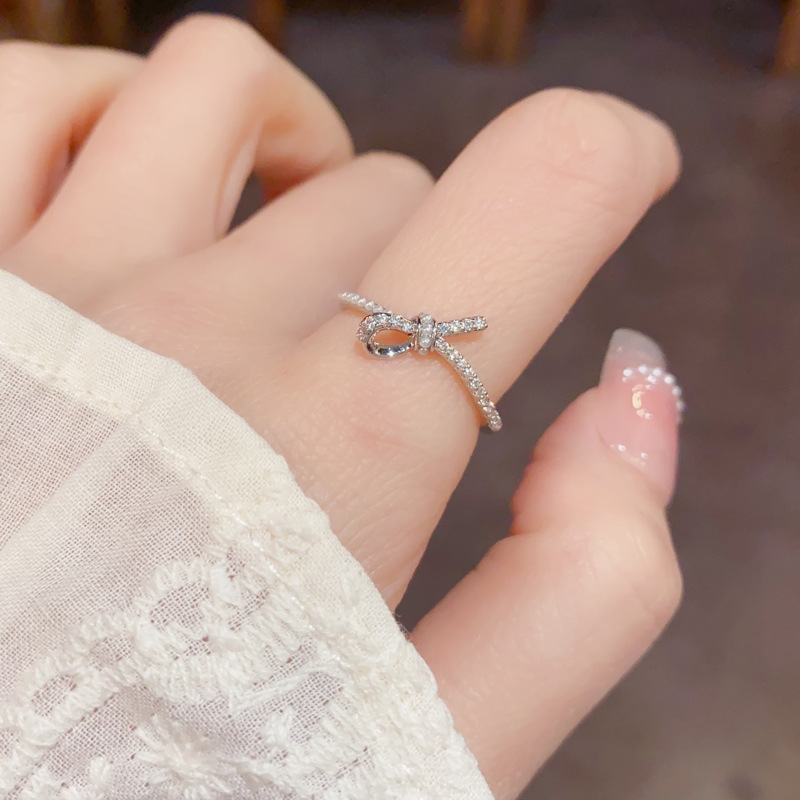 Wholesale of high-end index finger rings with a unique and fashionable design sense, featuring a zircon knot and an open ring that exudes a feminine charm, is simple, luxurious and versatile