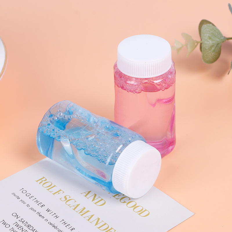 The small bottle replacement bottle inside the bubble machine, the popular bubble water bottle filled with bubble replenishment liquid, blowing bubble water, Bai Sui Shan Specification image