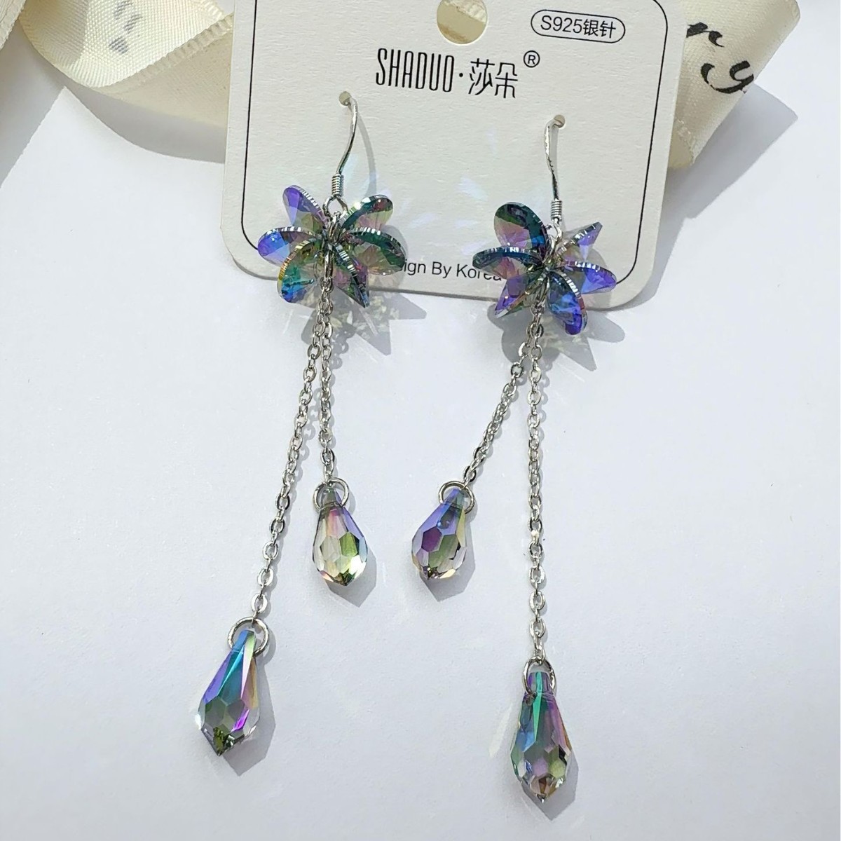 Silver star-shaped crystal stud earrings, silver needle vintage jewelry earrings and earrings details Picture