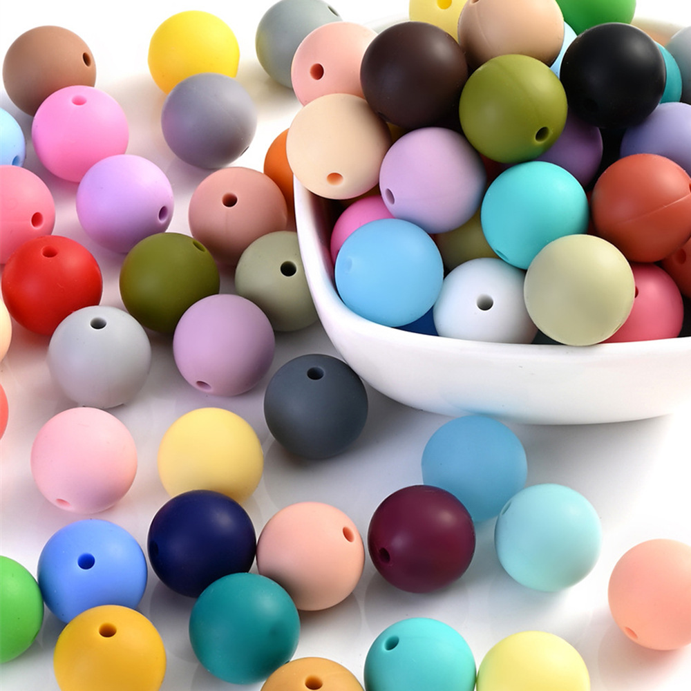 Factory stock custom-made silicone 12mm round beads, loose beads, string beads jewelry accessories, candy-colored silicone beads baby jewelry Application Scenario