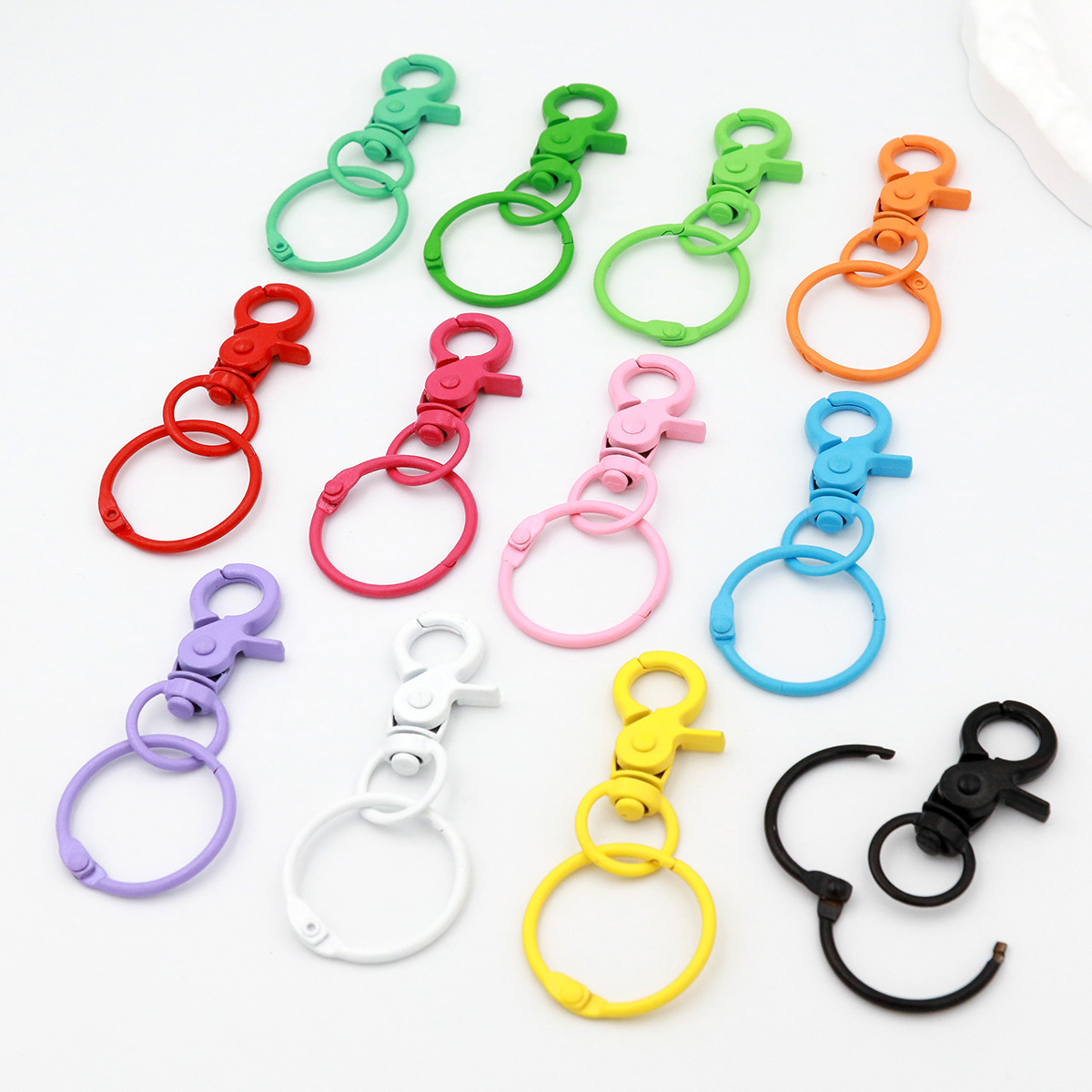 diy keychain accessories, colorful handcrafted keychain pendants, figurines, lacquered bag pendants details Picture