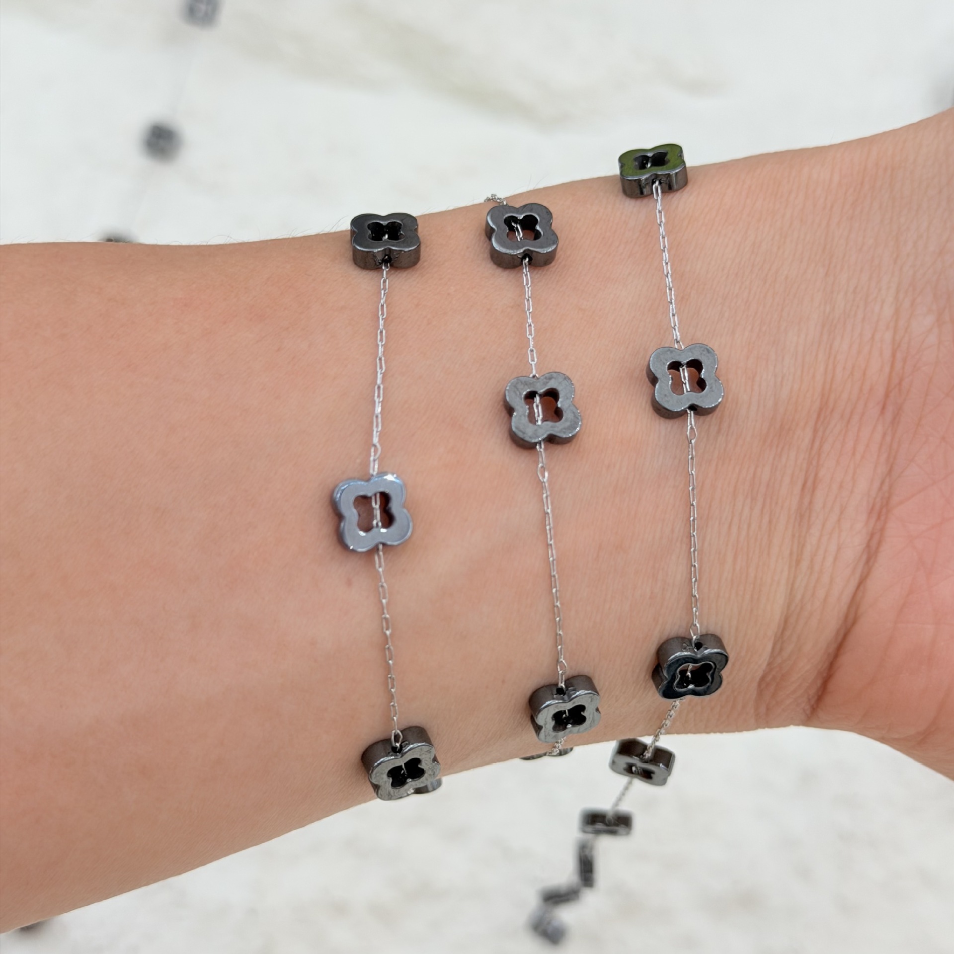 Hollowed-out four-leaf clover black gallstone 12-hole chain DIY earrings necklace, cold style handcrafted semi-finished jewelry wholesale Application Scenario