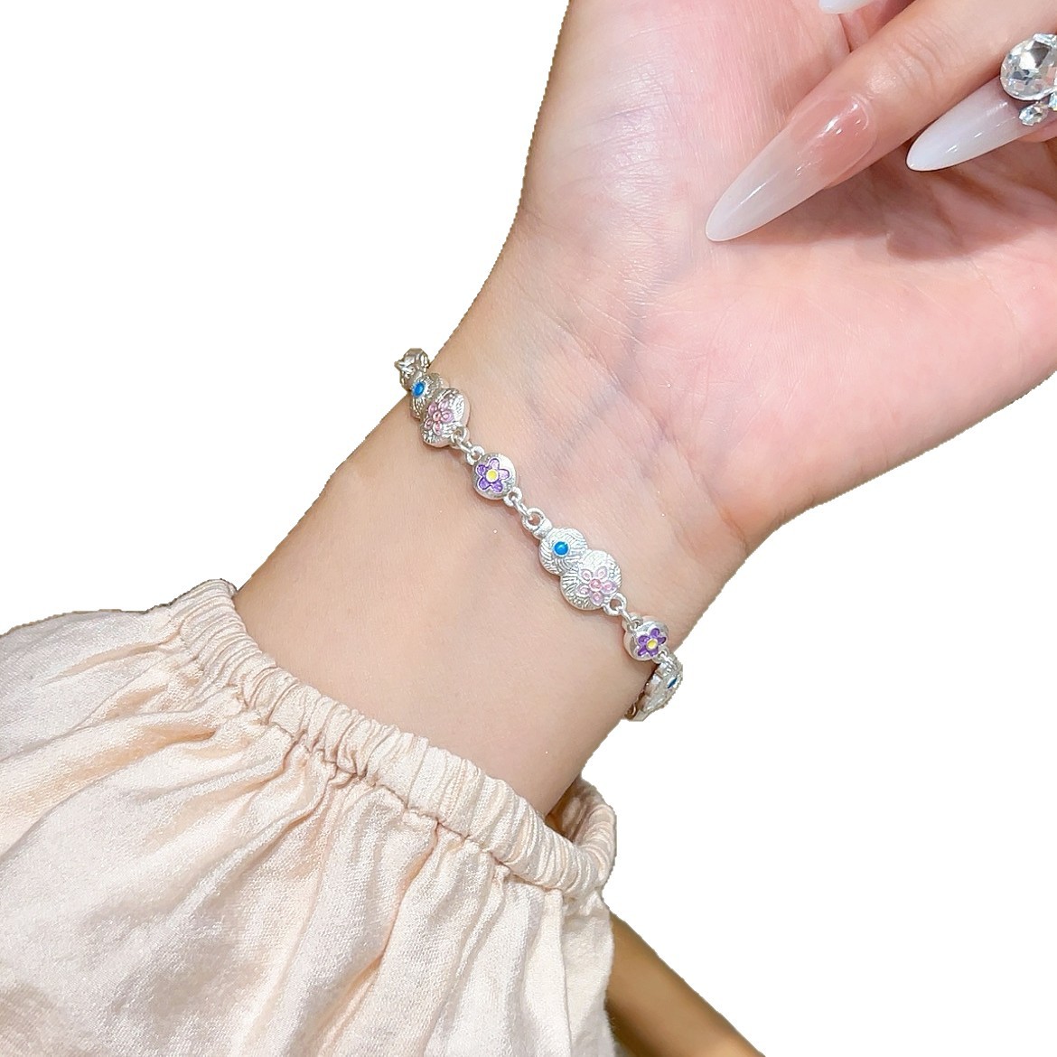 In 2025, a new style of traditional Chinese trend enamel gourd-shaped butterfly clasp hanging lucky bag bracelet with ethnic style and copper plated with Miao silver Item Picture