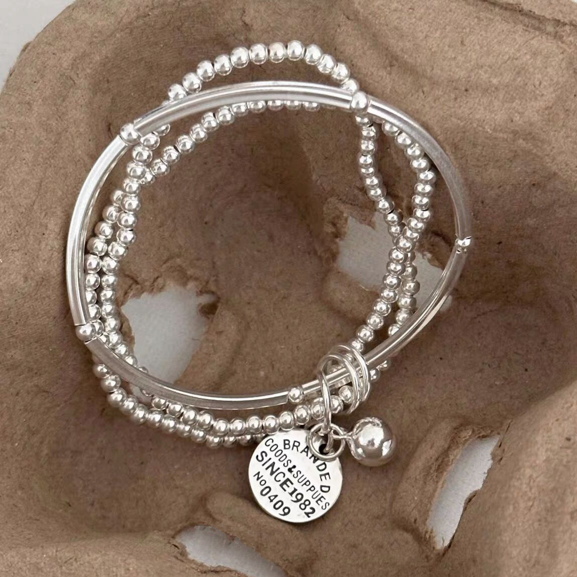 Three-layer multi-loop round bracelet, Korean S925 sterling silver InS-style curved tube elastic rope, silver bead elastic rope bracelet for women Specification image