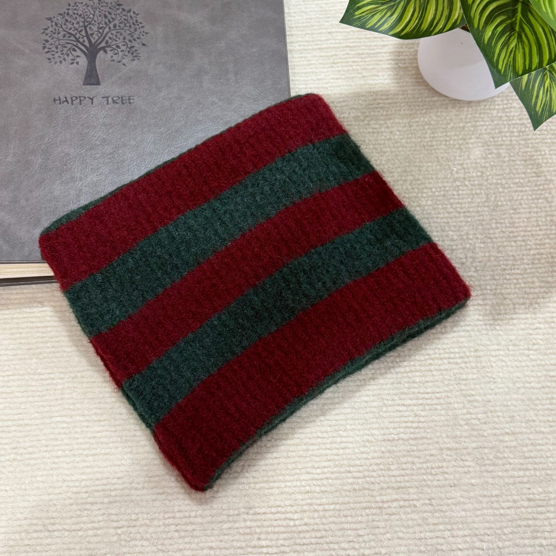 This is a versatile and face-enhancing autumn and winter knitted woolen cap with ear stripes for face protection, windproof and warmth in winter