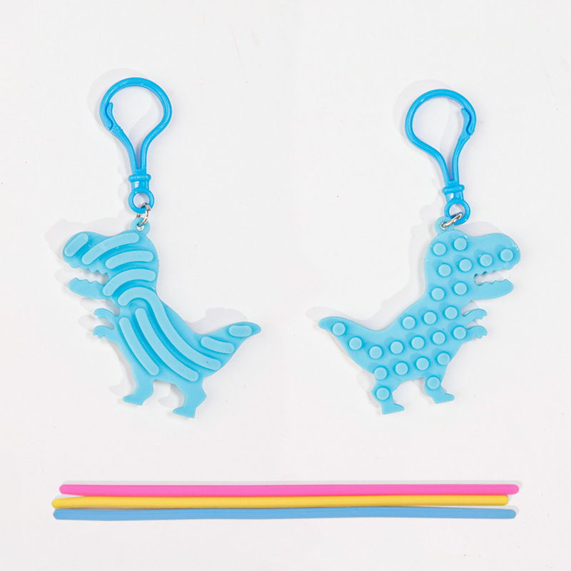Silicone stress-relieving sensory mini keychain pendants, cartoon dinosaur figurines, schoolbag pendants, small gifts wholesale Application Scenario