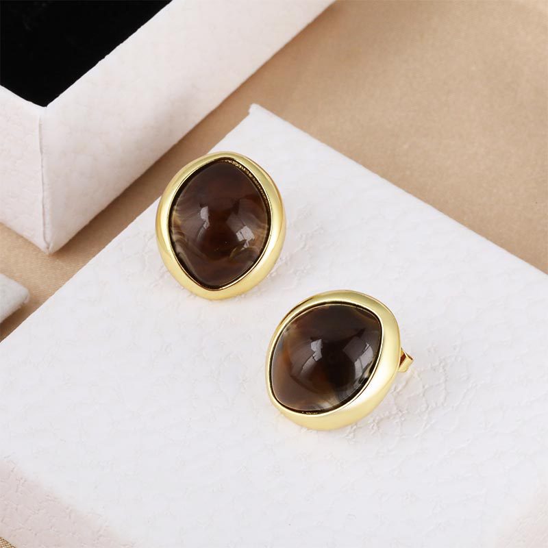 Wholesale and direct sales of cross-border copper-plated smooth resin button cat-eye round high-end light luxury stud earrings and earrings from the manufacturer Specification image