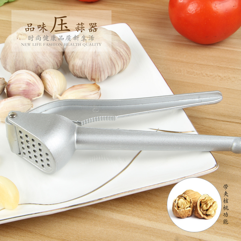 Low-price wholesale of stainless steel garlic press, garlic peeler, garlic puree press and aluminum garlic puree press tools