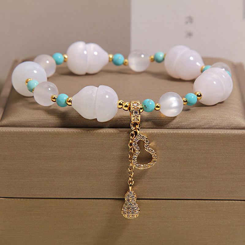 Nuevo estilo chino luz se convierte en rosa de melocotón calabaza pulsera de cristal para mujeres luz de lujo nicho alto sentido exquisito y versátil BFF mano cadena Item Picture