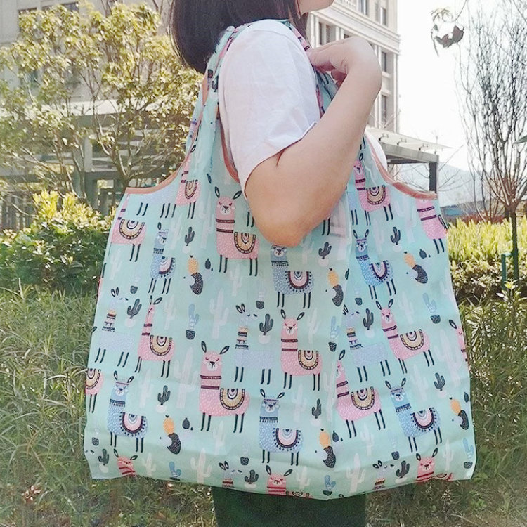 Wholesale of 2025 new folding shopping bags, flower-patterned portable polyester hand-held storage bags, large-capacity supermarket grocery bags Specification image