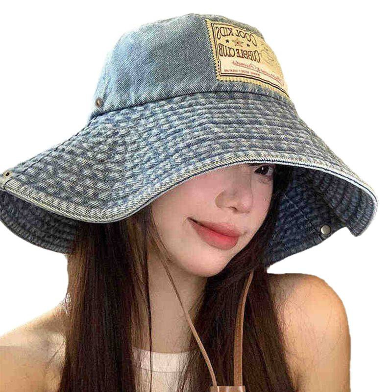 Korean outdoor windproof mountaineering hat, autumn hat, women's large brim to show off face, small fisherman hat, versatile washable denim hat Application Scenario