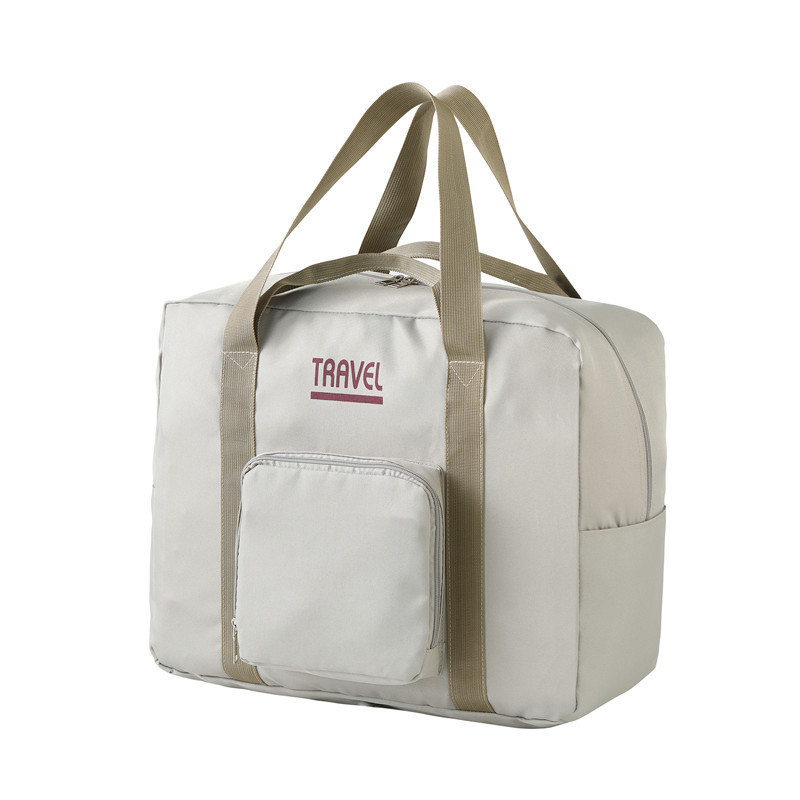 旅行包/真空夹层包/行李包男士休闲/朝觐抽绳包/多口袋拉杆行李包白底实物图