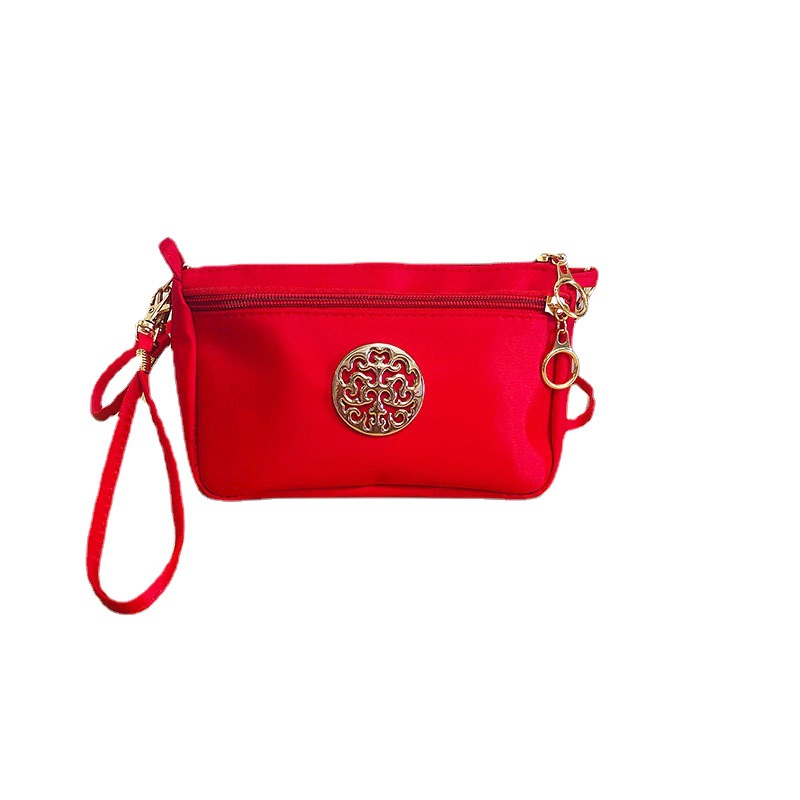 The new style is a hand-held bag that can be carried or carried, a single-shoulder crossbody bag, a small storage cosmetic bag, and a fashionable small phone bag Item Picture